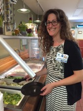 Littauer dietician Alexandra Barbieri makes a salad for lunch in the hospital cafe