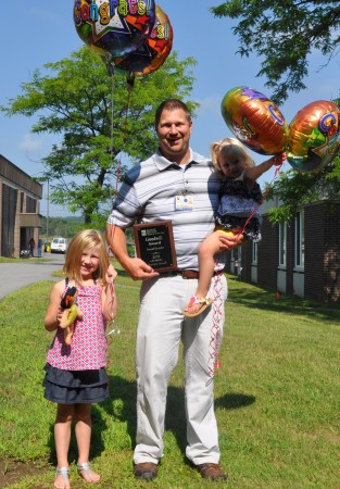 Littauer 2016 second-quarter Goodwill Award recipient, MIS System Administrator Matthew Romrell, with daughters Makenna age 5, and Macie age 2