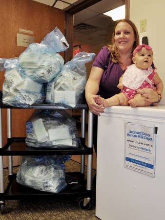 Littauer Radiologic Technologist, Amanda Fosman with infant daughter Aria, donates excess breastmilk to Littauer's Milk Depot