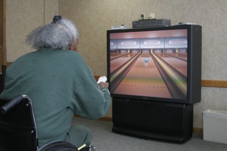 Residents enjoy a game of Wii