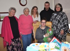 Seated is Littauer’s first baby of 2016, Raymond Emile Meyer III, held by his mother Briana Perez if Gloversville. Standing is NLH&H Auxiliary New Year Baby Chairman Anita Beck, left, Auxiliary President Norma Cozzolino, Joslyn Mitchell, Raymond Meyer II, and NLH Director of Volunteer Services Susan McNeil