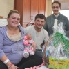 - Meagan Fleaszar and Austin Syzdek with newborn daughter Sophia Syzdek, and Jean LaPorta, President, Friends of the Gloversville Public Library