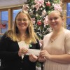 Gloversville High School student Kristen Farley, right, presents a check to Littauer VP Marketing, Communications, & Public Relations, Cheryl McGrattan for $850. The funds were raised to support the Littauer Birthing Center Baby Box program.